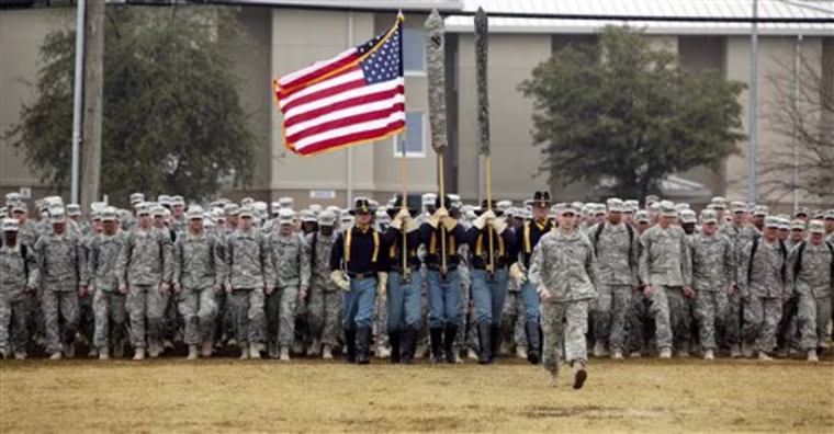 U.S. Army 1st Cavalry 3rd Brigade soldiers march onto the parade grounds upon their return home from deployment in Iraq, Saturday, Dec. 24, 2011, at Fort Hood, Texas. These 3rd Brigade troops were in the last convoy to leave Iraq. (AP Photo/Erich Schlegel)